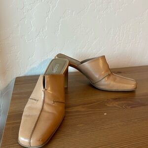 Beige leather and wood heels